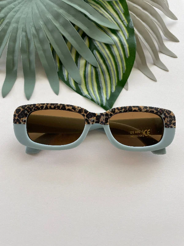 Sheer Bodysuits for a Seductive and Alluring OutfitRectangle Two Tone Cheetah Sunglasses - Sky Blue Sheer Bodysuits for a Seductive and Alluring OutfitRectangle Two Tone Cheetah Sunglasses - Sky Blue