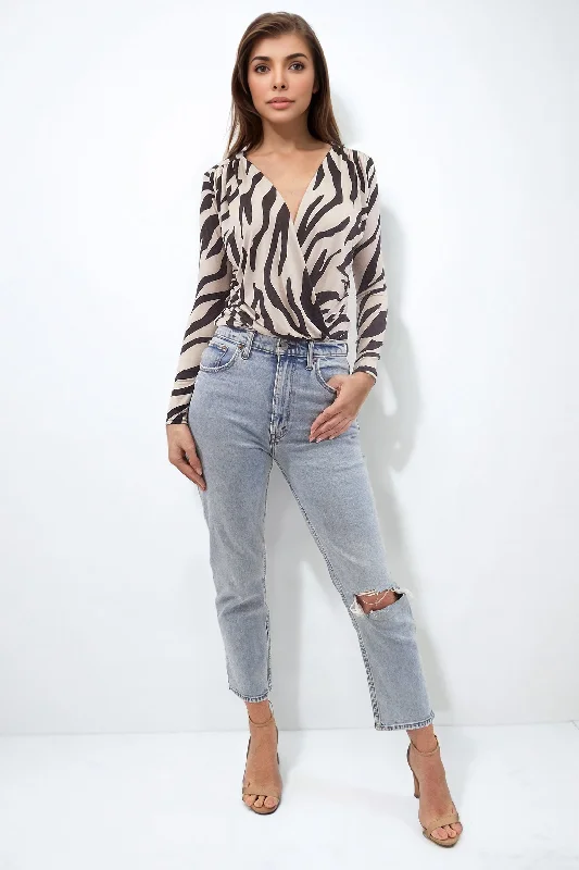 Sleeveless Bodysuits for a Cool and Casual Summer LookDANI ZEBRA ANIMAL PRINT BODY WITH LONG SLEEVES Sleeveless Bodysuits for a Cool and Casual Summer LookDANI ZEBRA ANIMAL PRINT BODY WITH LONG SLEEVES